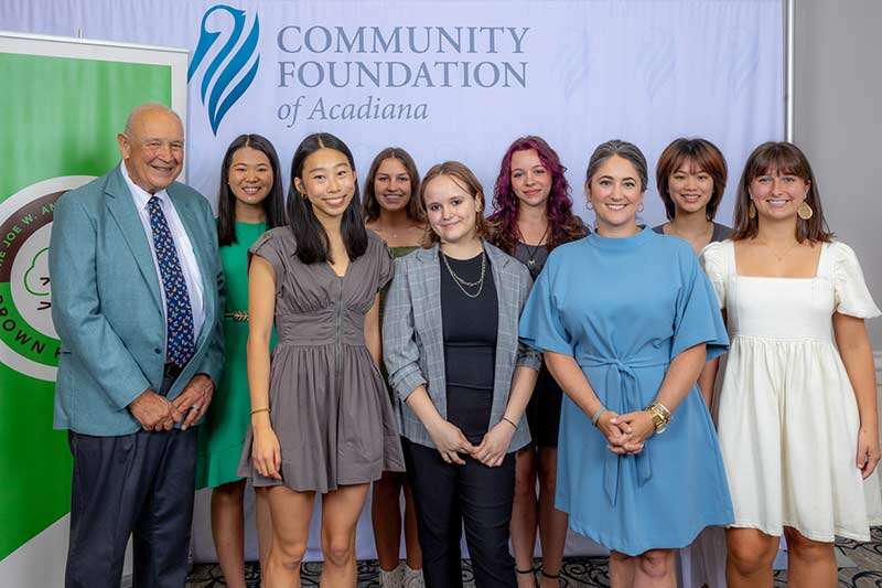 ENA Program Founder Ed Hunter, Iris Xue (ENA Scholar), Michelle Brown (Silver Medalist), Ivy Jiang (ENA Scholar), Catherine Hust (Gold Medalist), Stella Bourke (ENA Scholar), CFA President & CEO Missy Bienvenu Andrade, Julia Loken (ENA Scholar), Louisa Zhu (ENA Scholar)